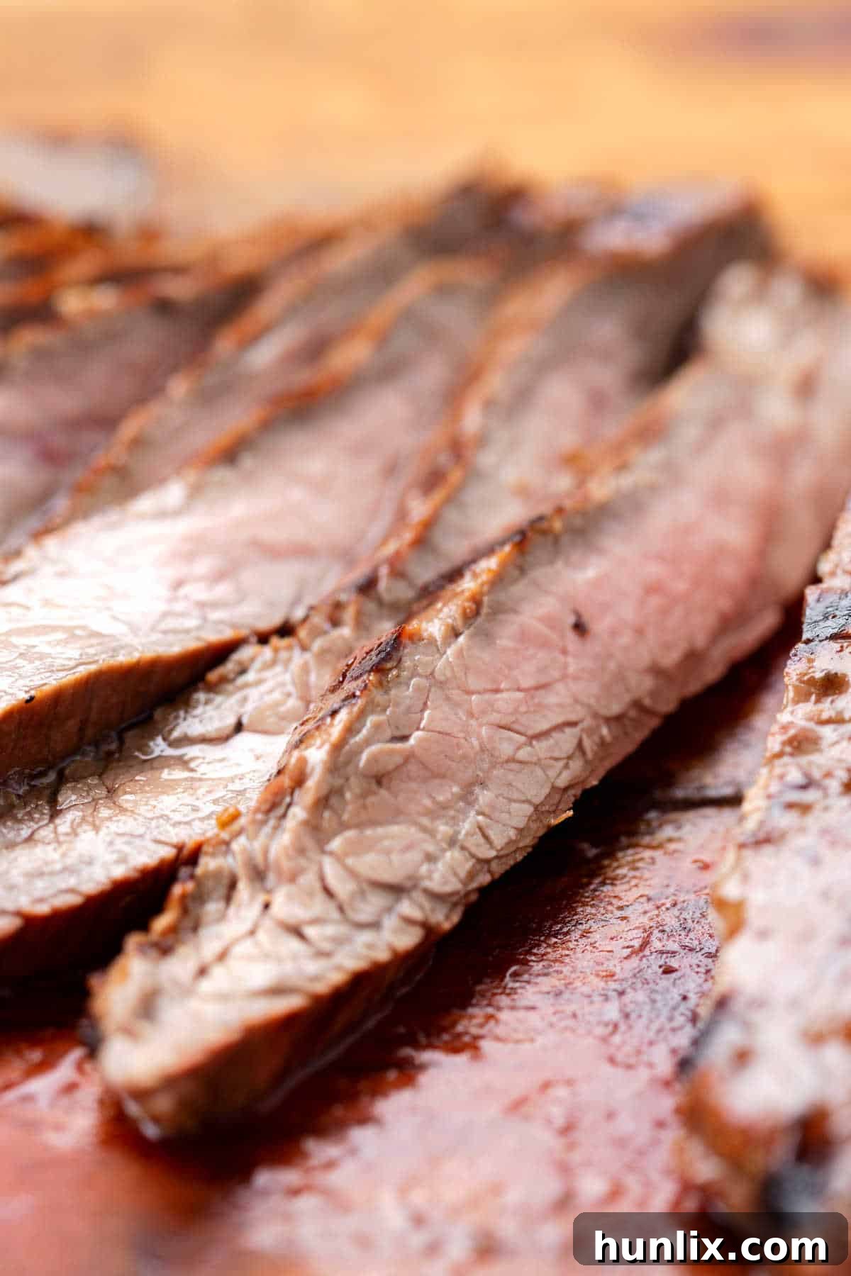 Slices of grilled flank steak.