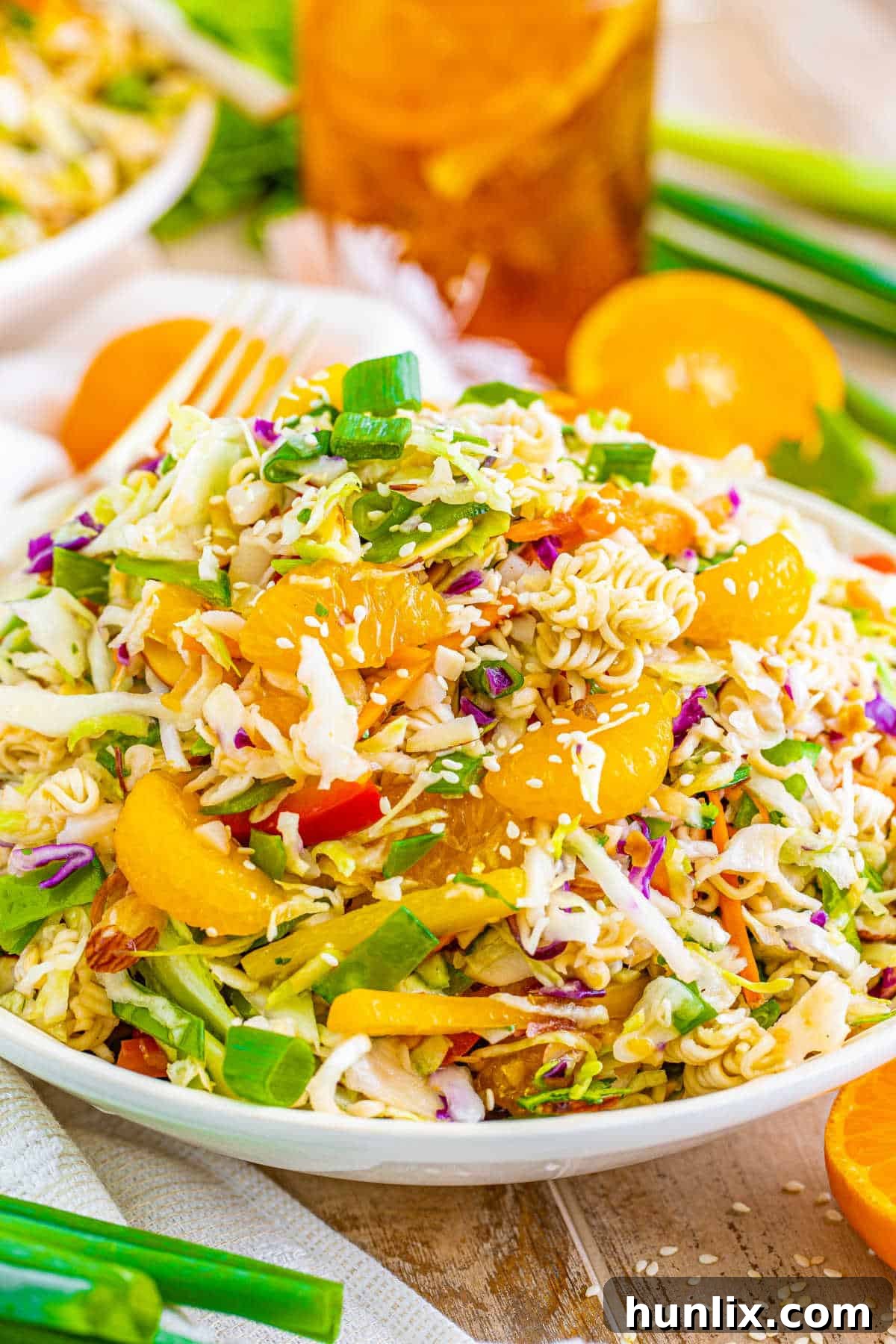 A close-up of ramen noodle salad in a bowl.