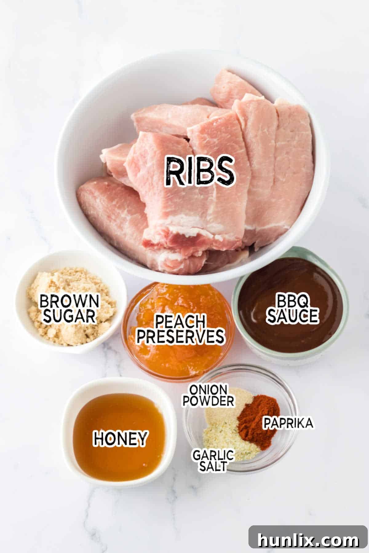 Melt-in-Your-Mouth Slow Cooker Country Ribs 3 Ingredients for slow cooker country style ribs laid out on a table.