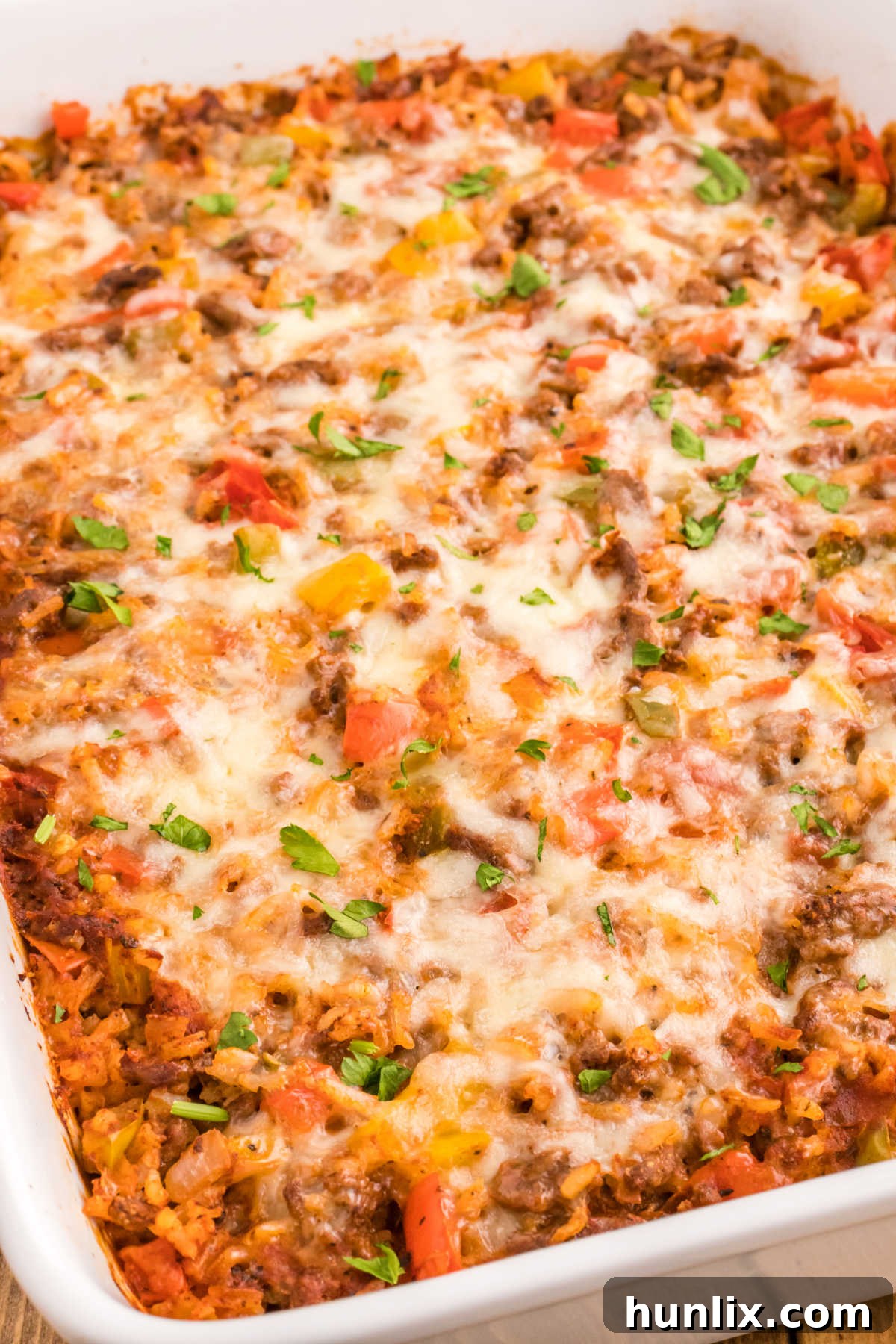 Stuffed pepper casserole in a white pan, ready to be served.