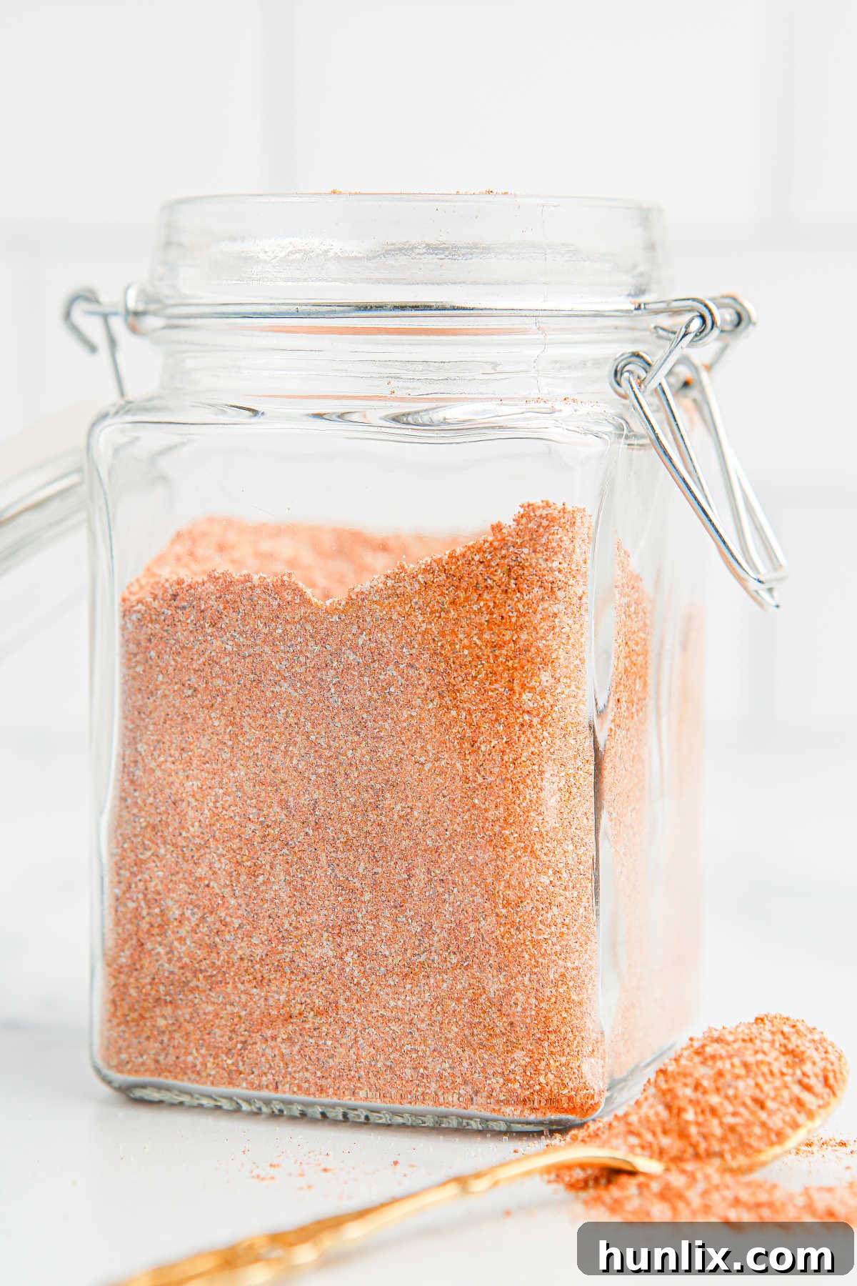 The Perfect Lawrys Inspired Seasoning Blend 6 Copycat Lawry's Seasoned Salt in a glass canister, with a clear label.