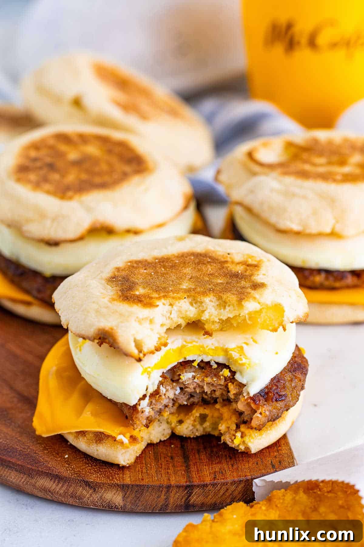 A breakfast sandwiche with a bite out of it.