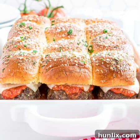 A plate of Meatball Sliders with the recipe title.