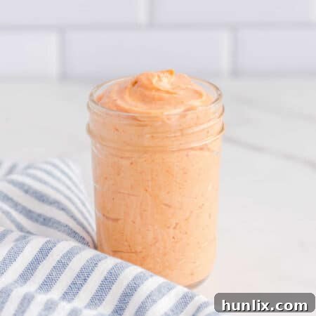 Yum Yum Sauce in a small bowl, garnished and ready to be served.