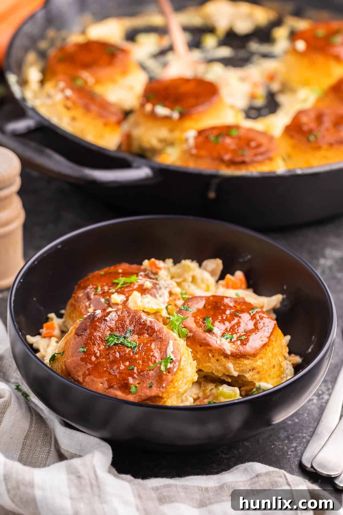 A bowl filled with a generous serving of cast iron skillet chicken pot.