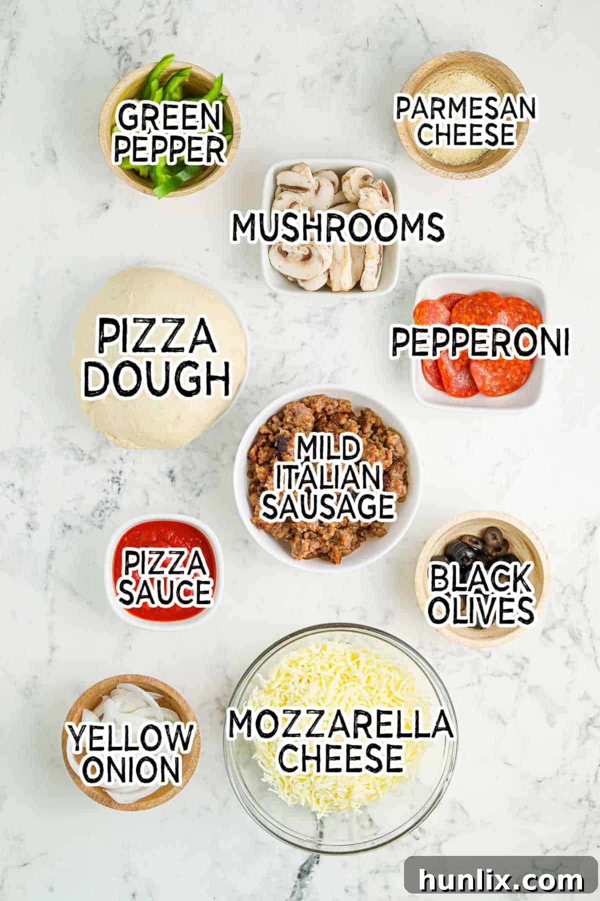 All the fresh ingredients laid out, ready to make Crockpot supreme pizza.