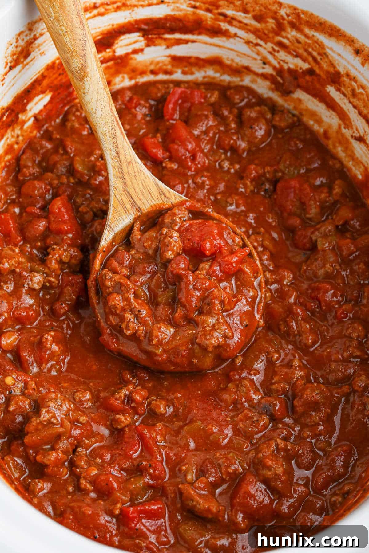 Hearty Frito Chili Pie cooked in a Crockpot, ready to be served.