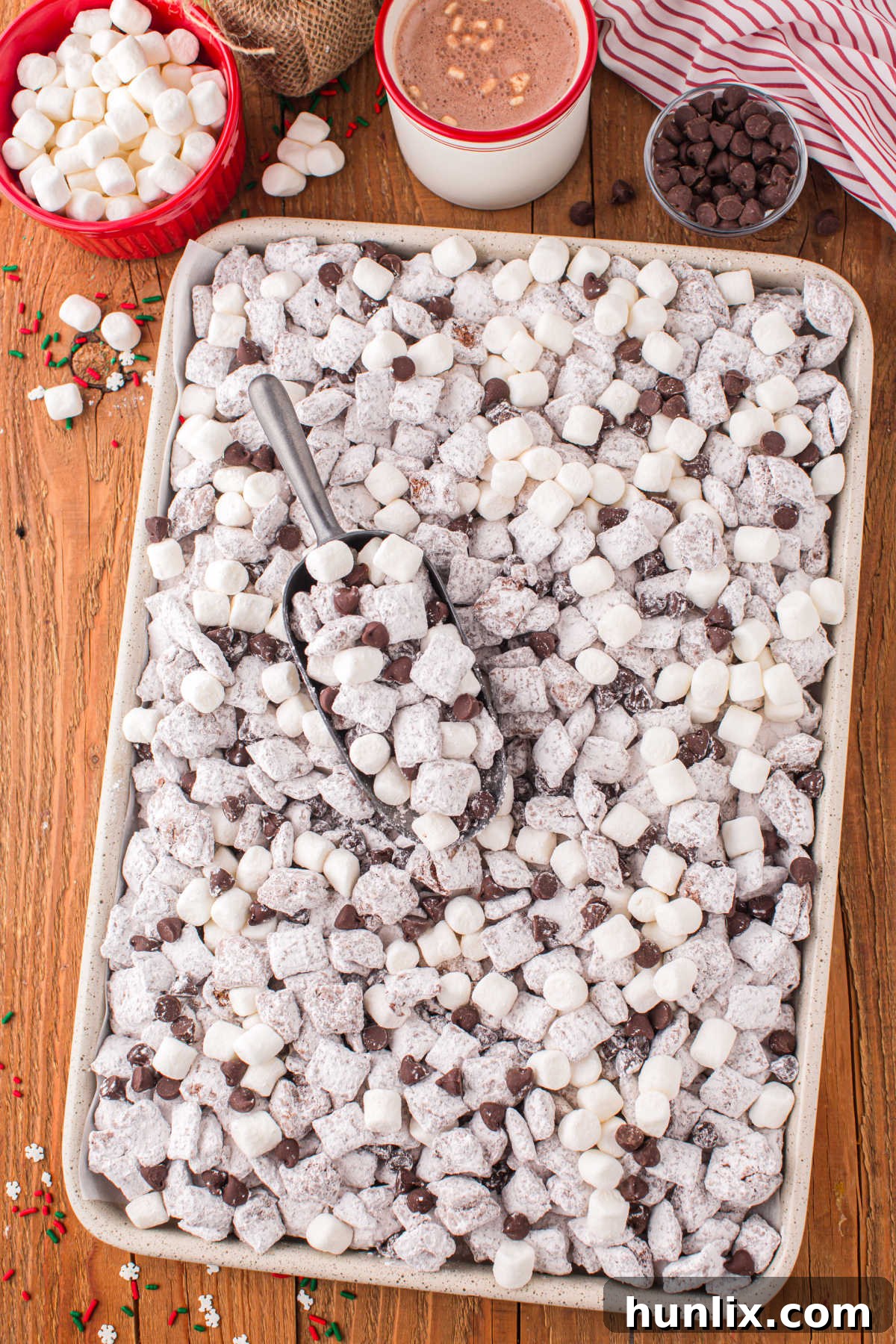 The recipe on a baking sheet with a serving scoop.