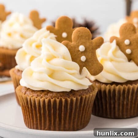 The finished gingerbread cupcakes on a plate.