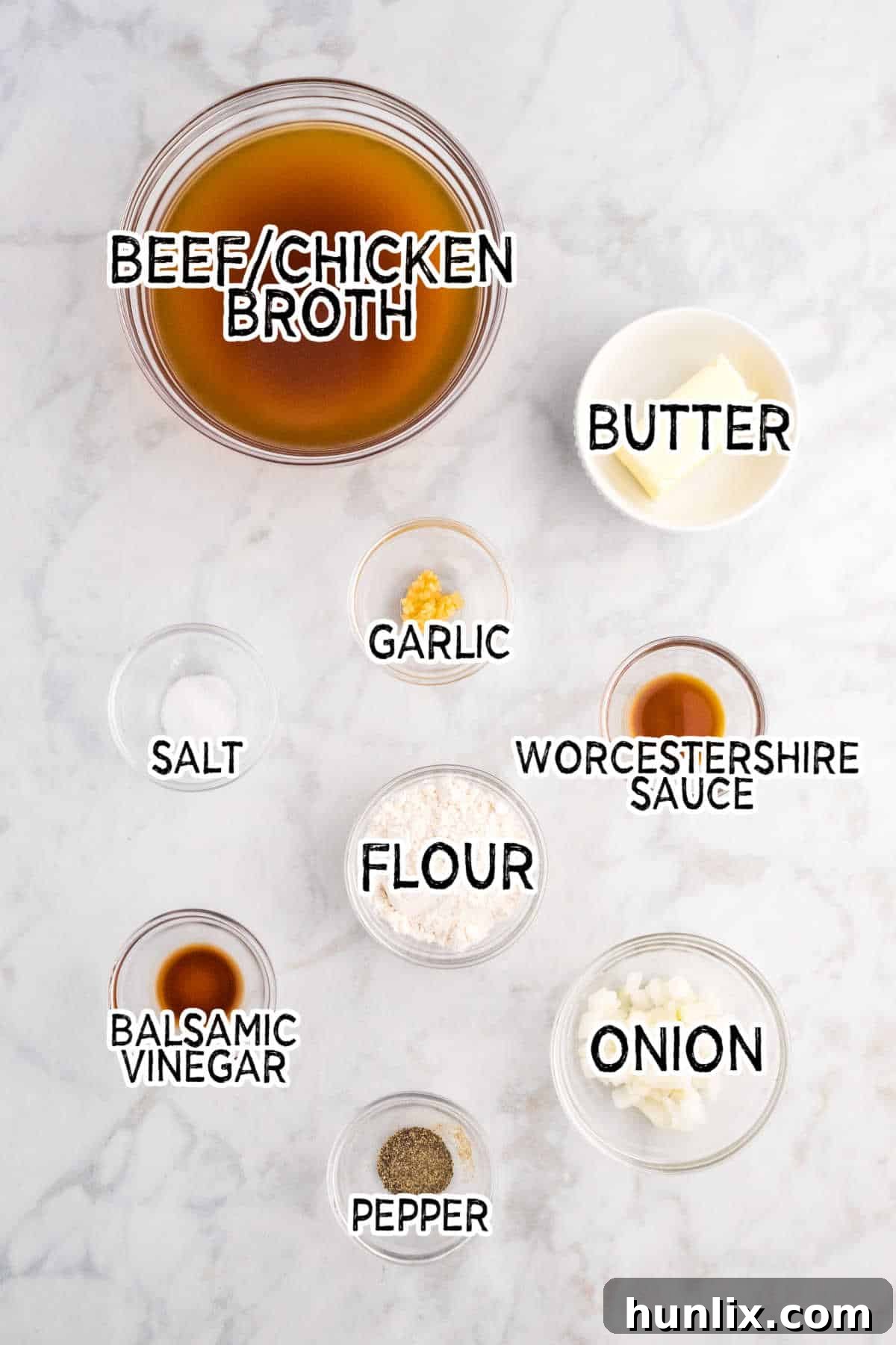 A collection of fresh ingredients neatly arranged on a counter, poised for the creation of delicious brown gravy.