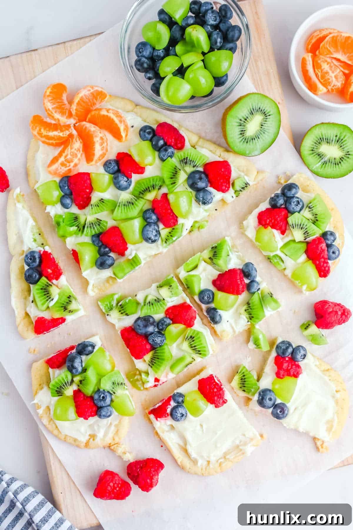 A festive sugar cookie Christmas tree presented on a white surface, ready to be enjoyed.