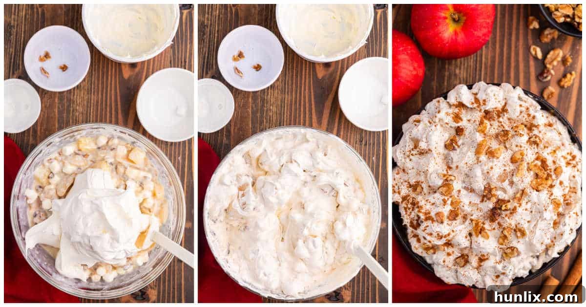 A closer view of the Apple Pie Fluff mixture being gently folded in a bowl, showcasing the creamy texture.