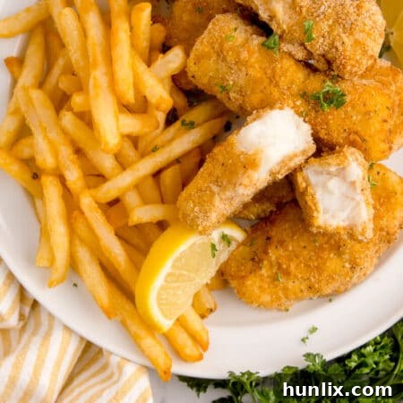 The recipe on a plate with fries.