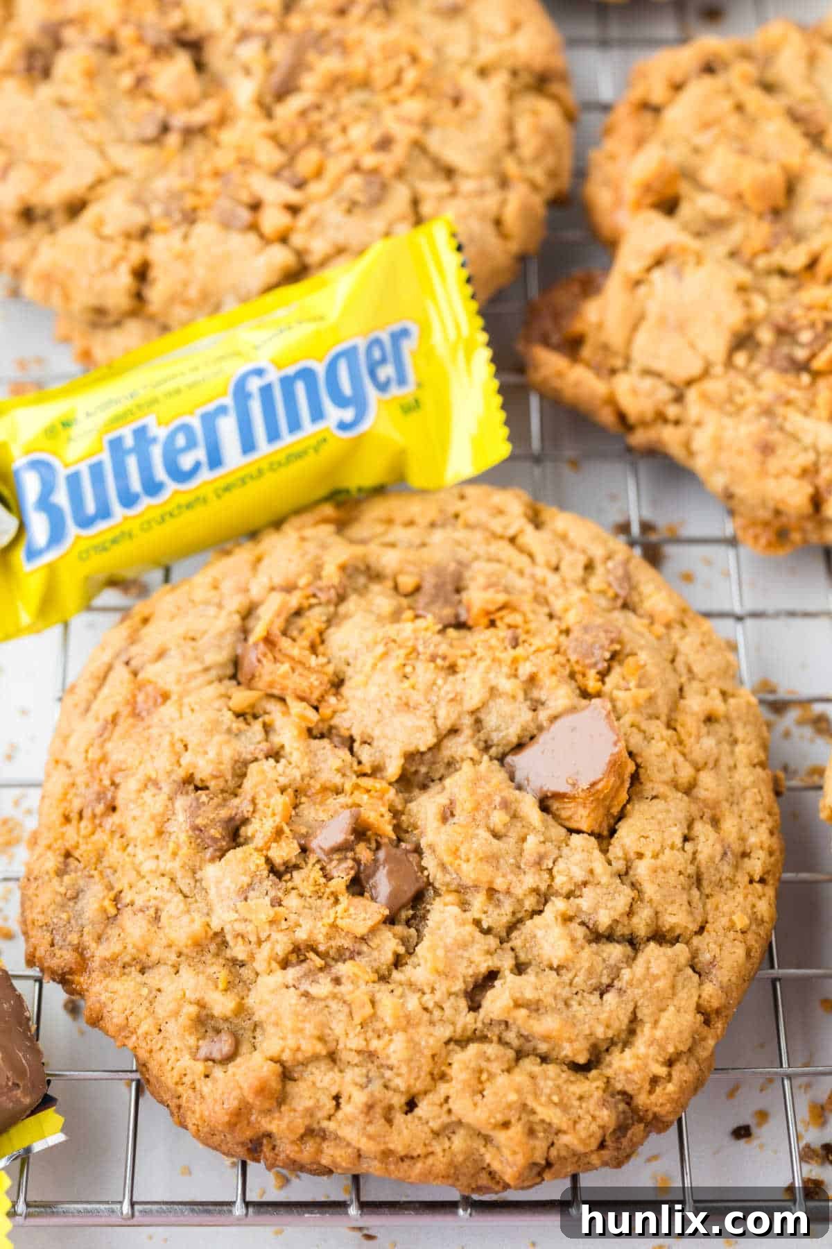 Butterfinger cookies cooling on a wire rack.
