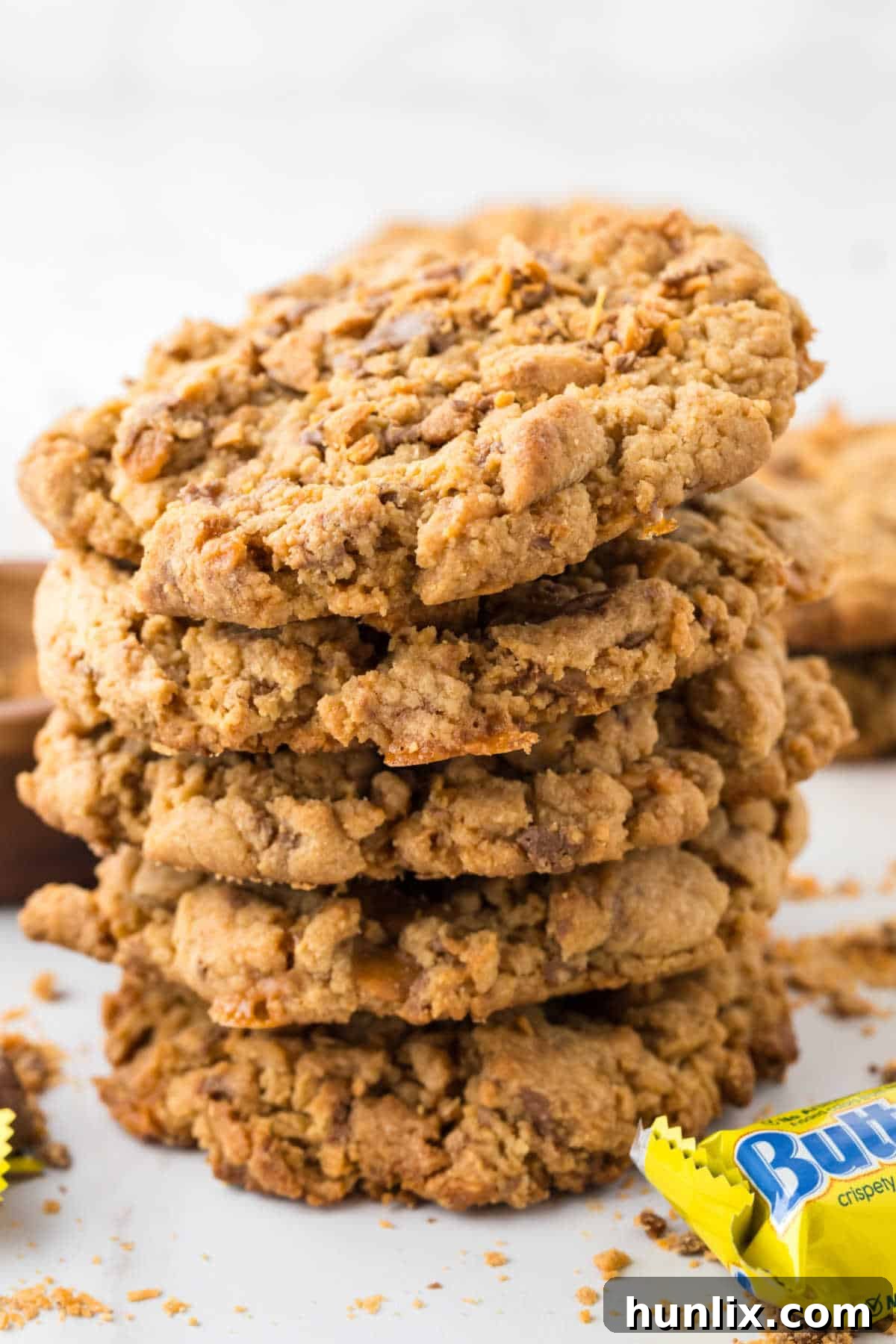 A stack of golden-brown Butterfinger cookies.