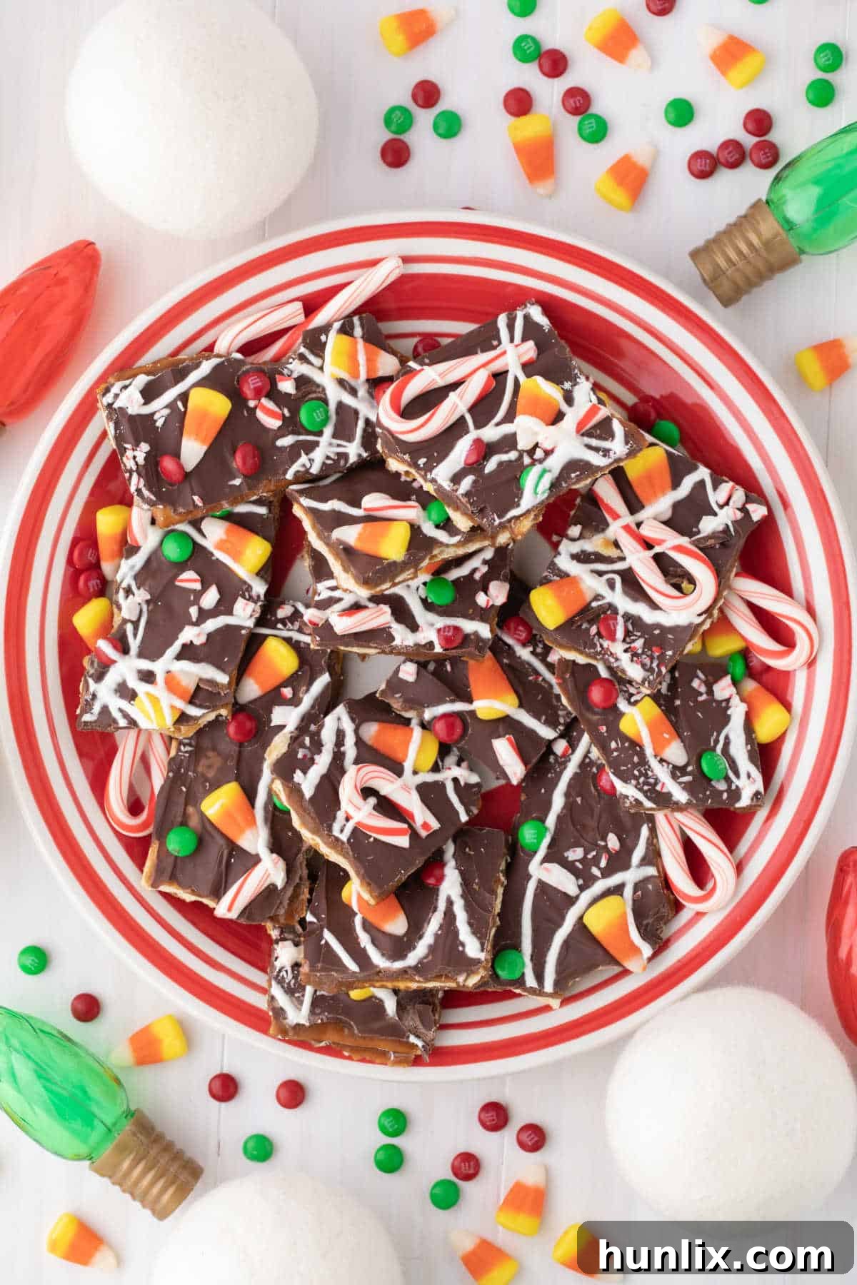 Buddy the Elf's Irresistible Christmas Crack 9 A plate featuring several pieces of Buddy the Elf Christmas Crack, ready to be enjoyed.