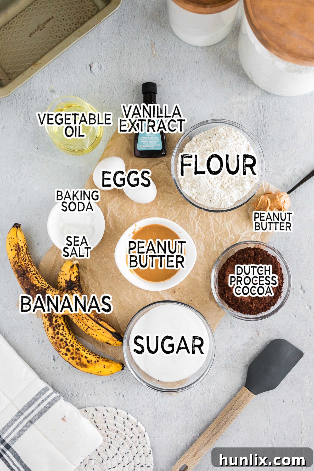 Ingredients to make chocolate peanut butter banana bread.