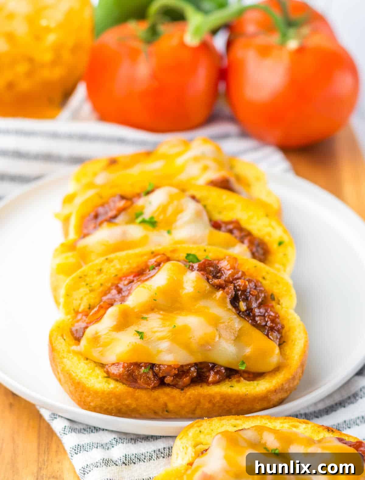 Texas toast sloppy joes on a plate, ready to be enjoyed.