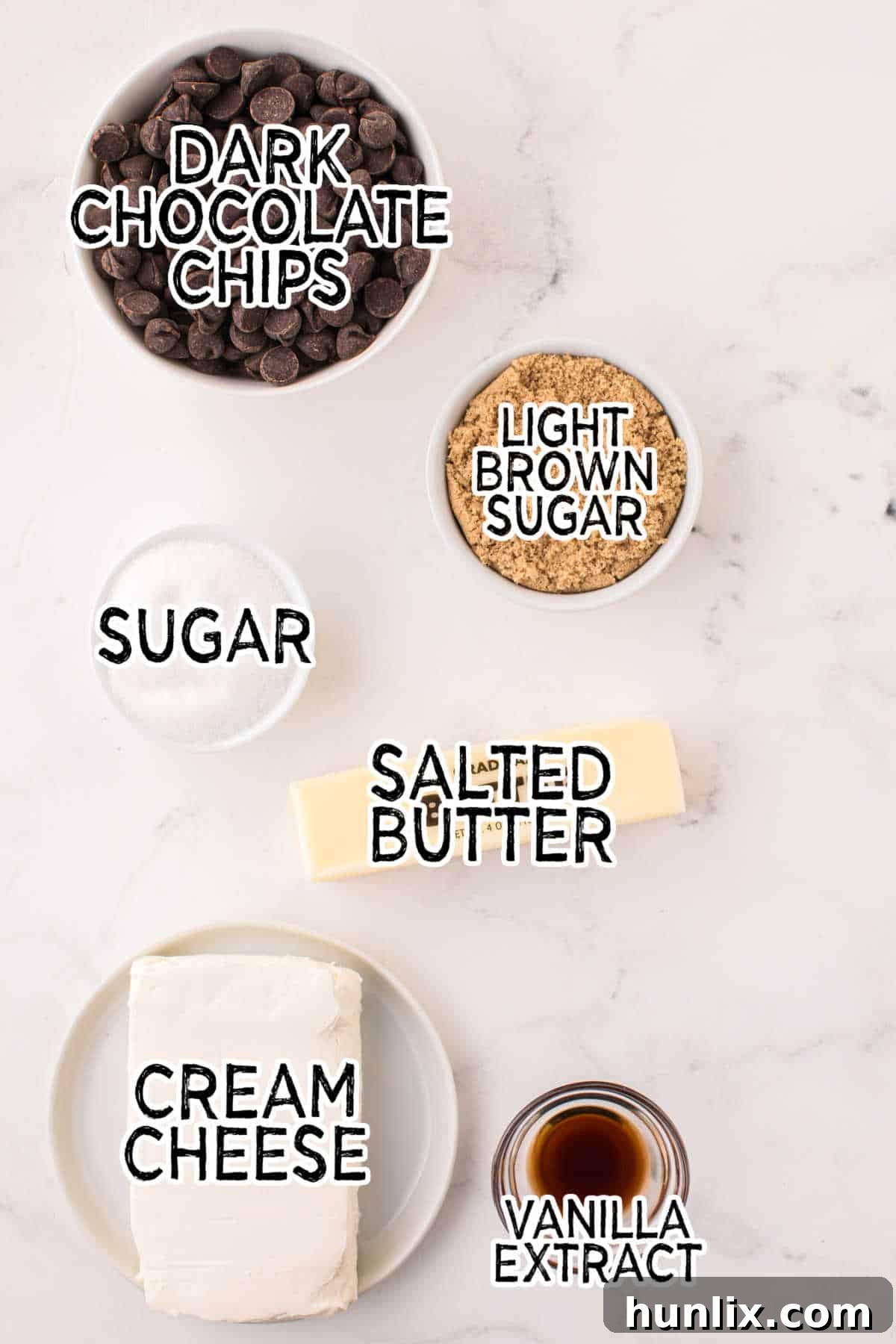 No-Bake Cookie Dough Dip 3 A vibrant flat lay of all the essential ingredients laid out for making chocolate chip cookie dough dip.