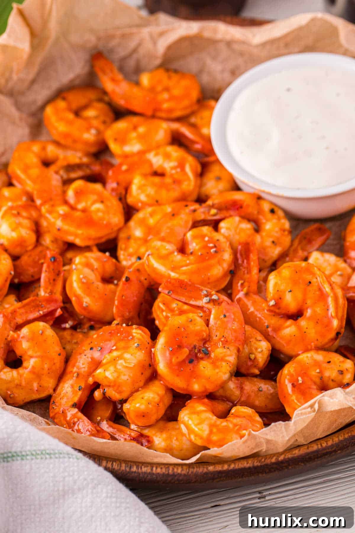 Crimson Glazed Shrimp 7 Buffalo shrimp in a basket.