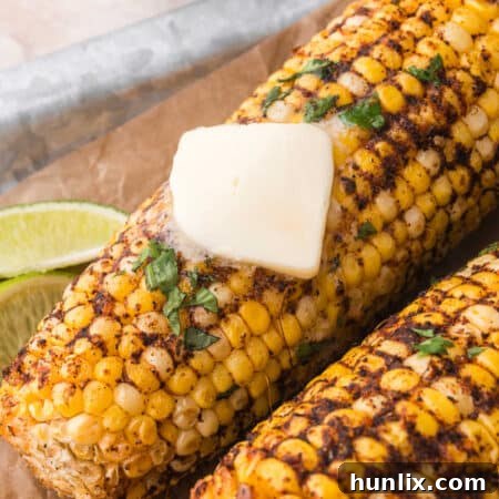 The recipe topped with butter on parchment paper.