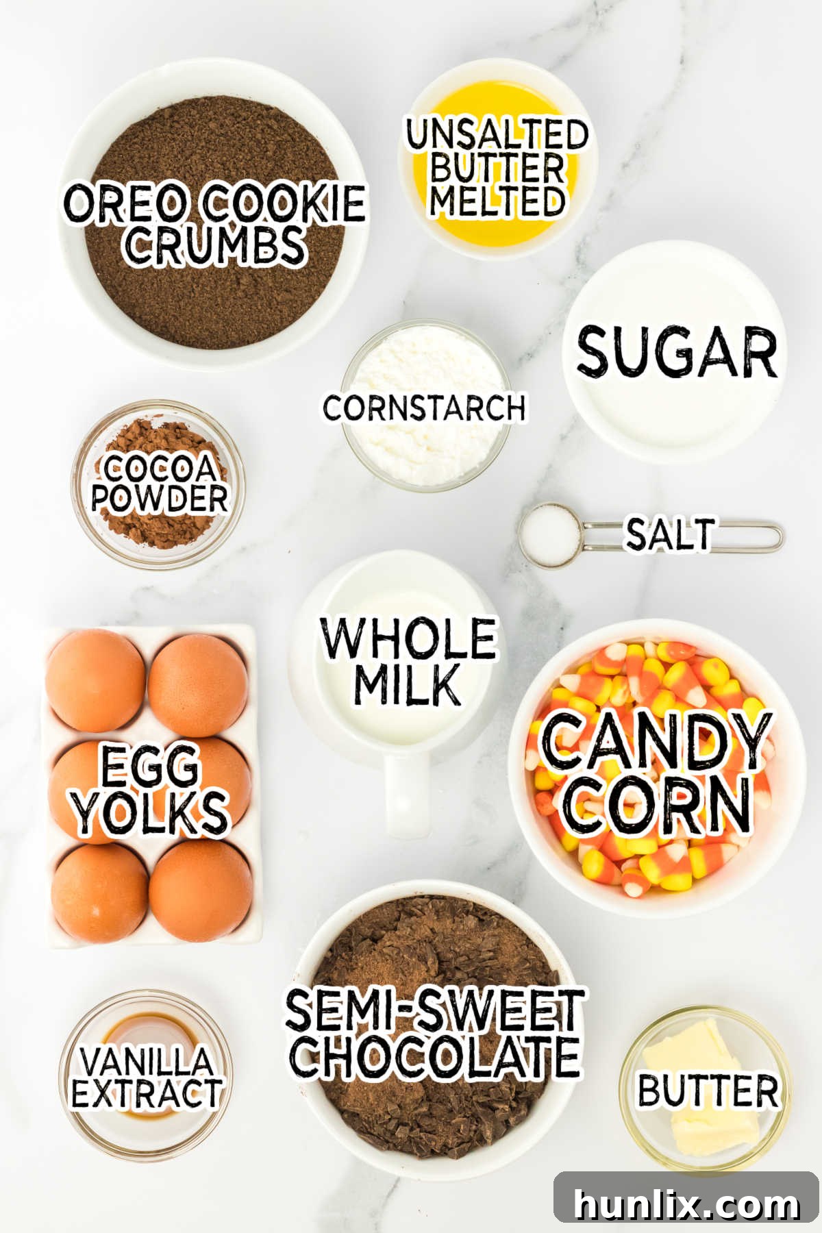 All the ingredients for making Candy Corn Pie laid out neatly on a table.