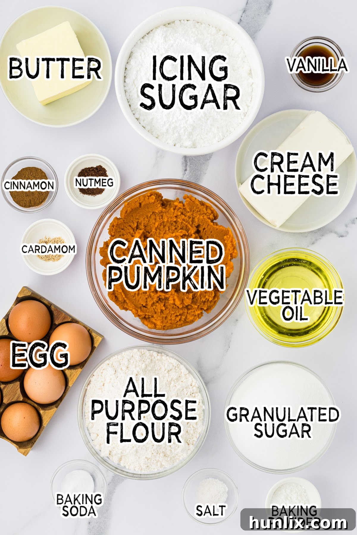 Ingredients on a white marble counter.