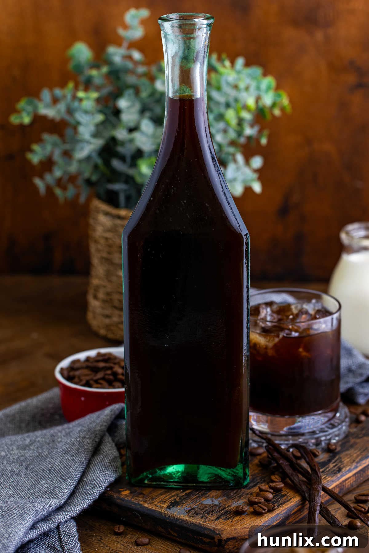 Craft Your Own Coffee Liqueur 2 A bottle of homemade Kahlua, showcasing its rich, dark color and inviting presentation.