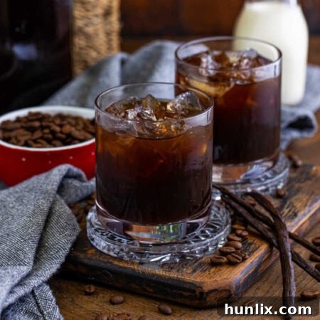 Craft Your Own Coffee Liqueur 9 Glasses of the homemade Kahlua, showcasing its inviting presentation.