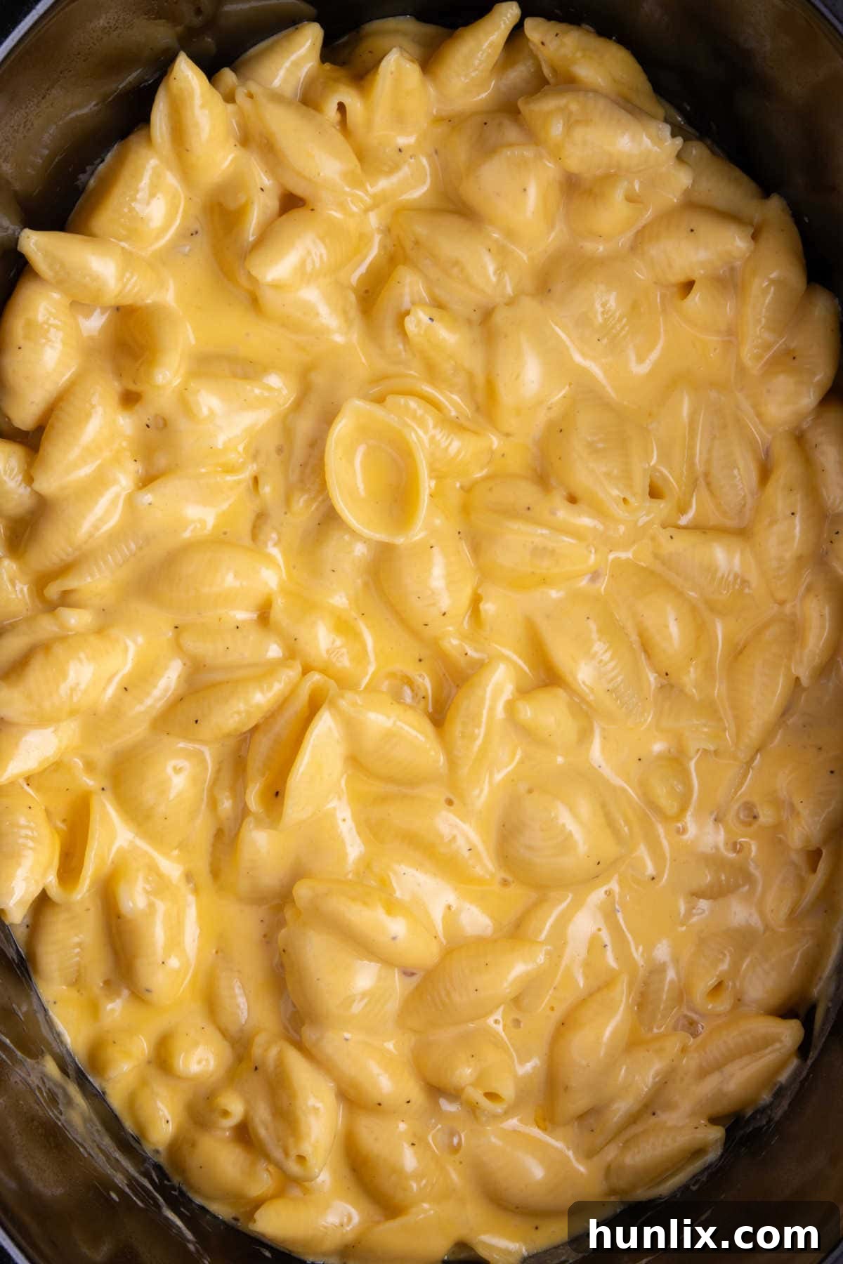 Creamy Slow Cooker Velveeta Mac and Cheese 2 Crockpot Velveeta Mac and Cheese in a slow cooker.
