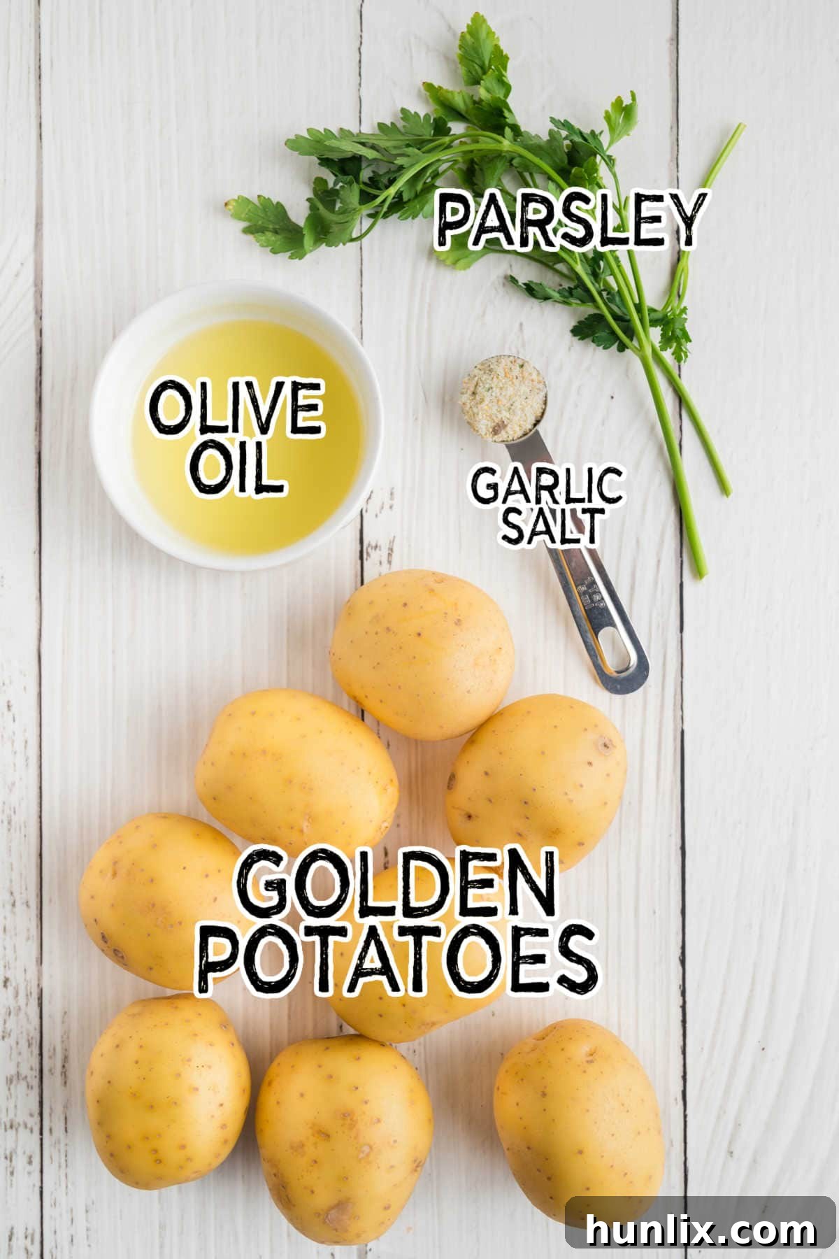 Ingredients on a white wood background.