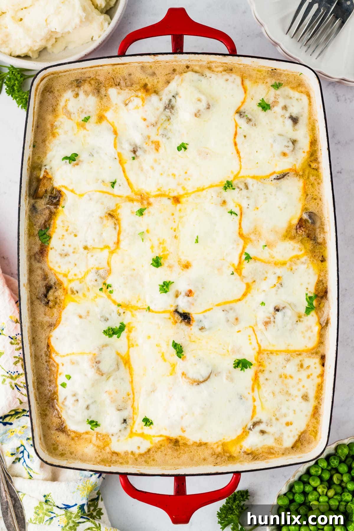 Chicken Gloria in a casserole dish, ready to be served.