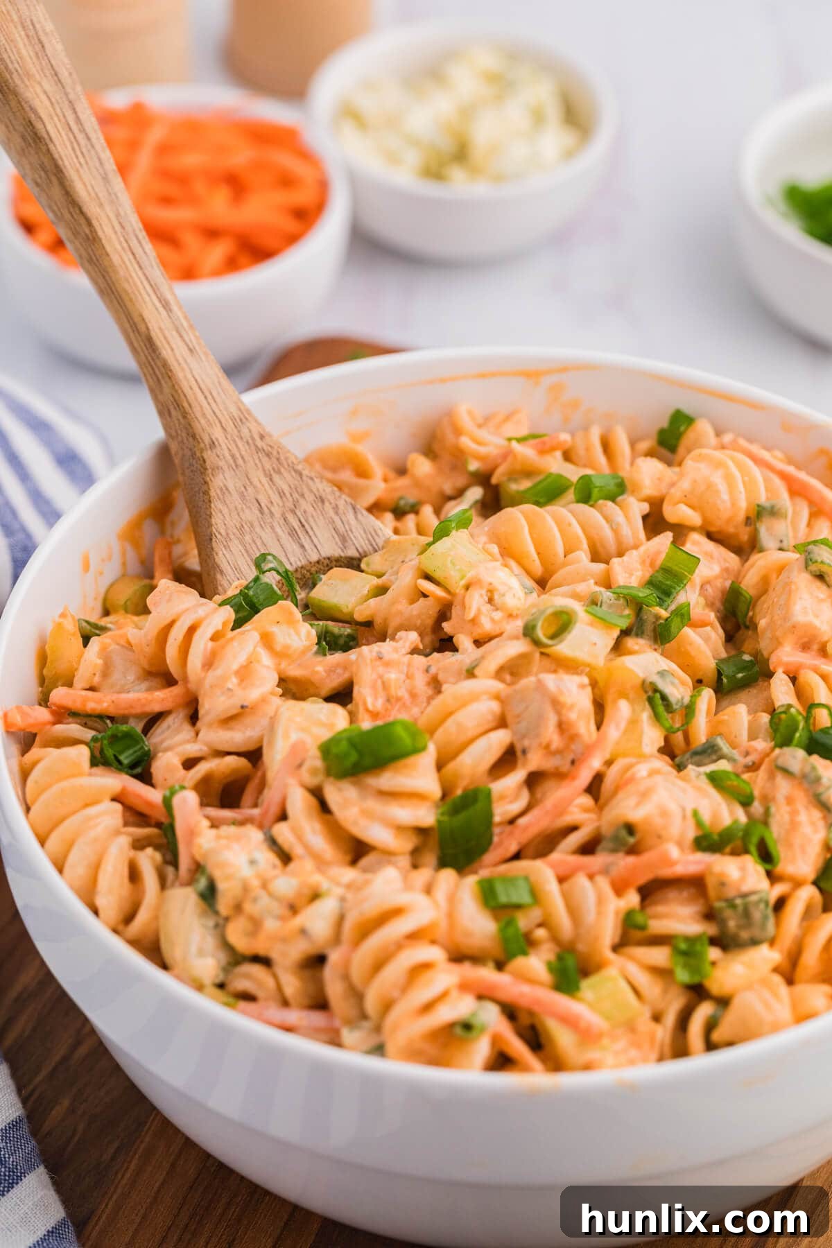 The recipe in a bowl with a wooden spoon.