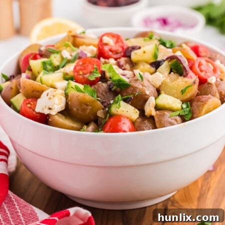 A white bowl of the recipe, showcasing its vibrant Greek ingredients.