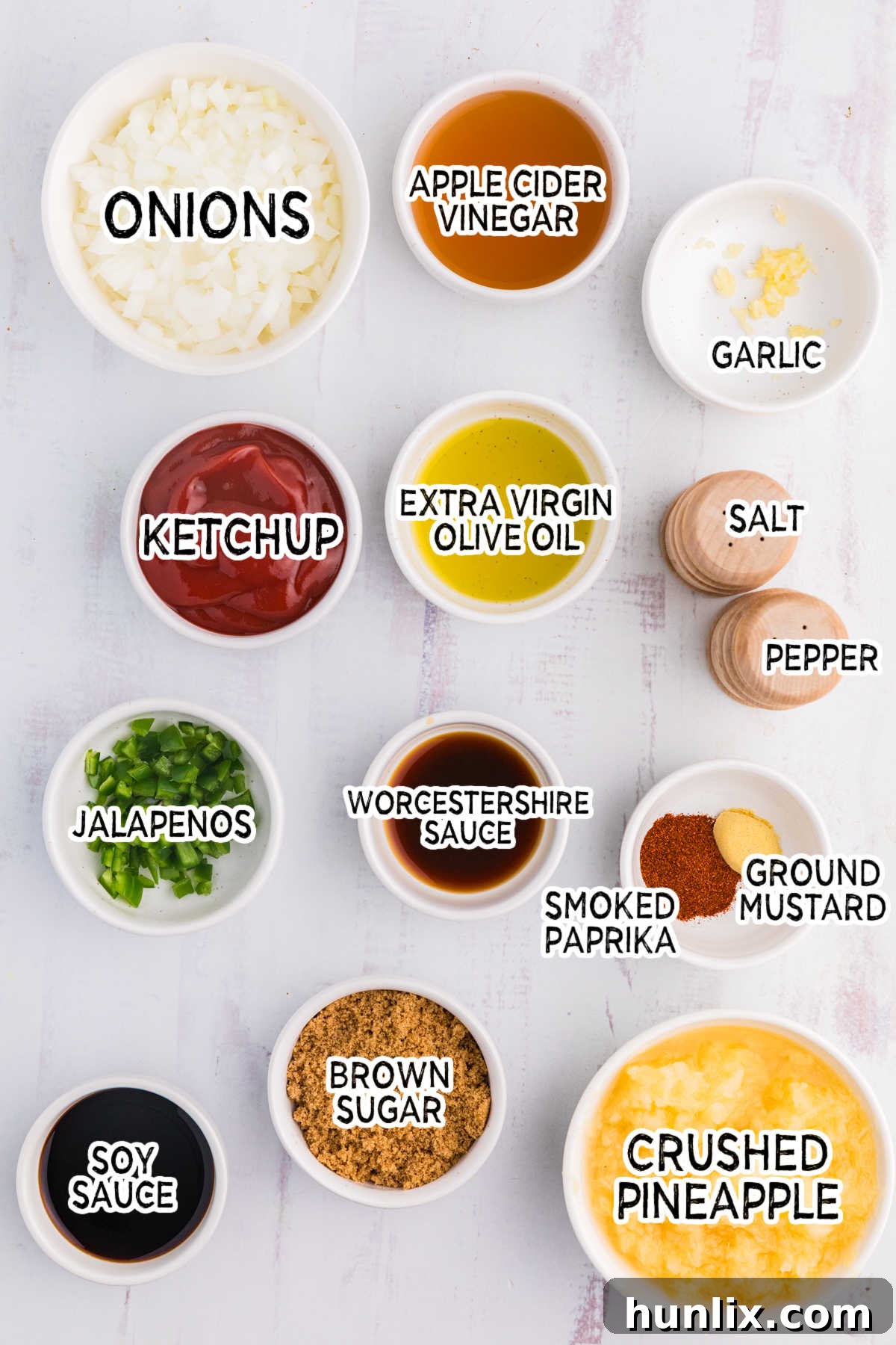 Sweet Heat Pineapple Jalapeno BBQ 3 Assortment of fresh ingredients for Pineapple Jalapeño BBQ Sauce on a white background.