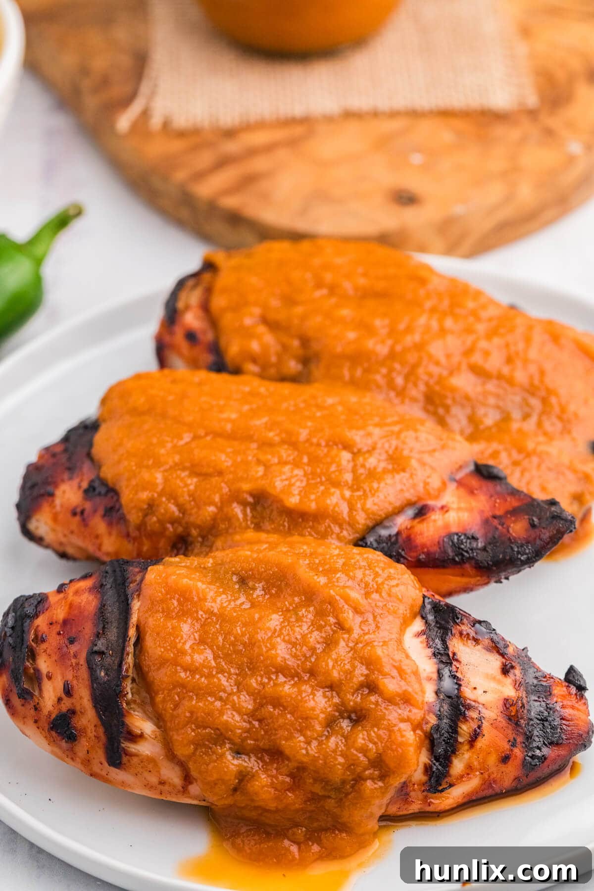 Sweet Heat Pineapple Jalapeno BBQ 7 A platter of grilled chicken coated in Pineapple Jalapeño BBQ Sauce.