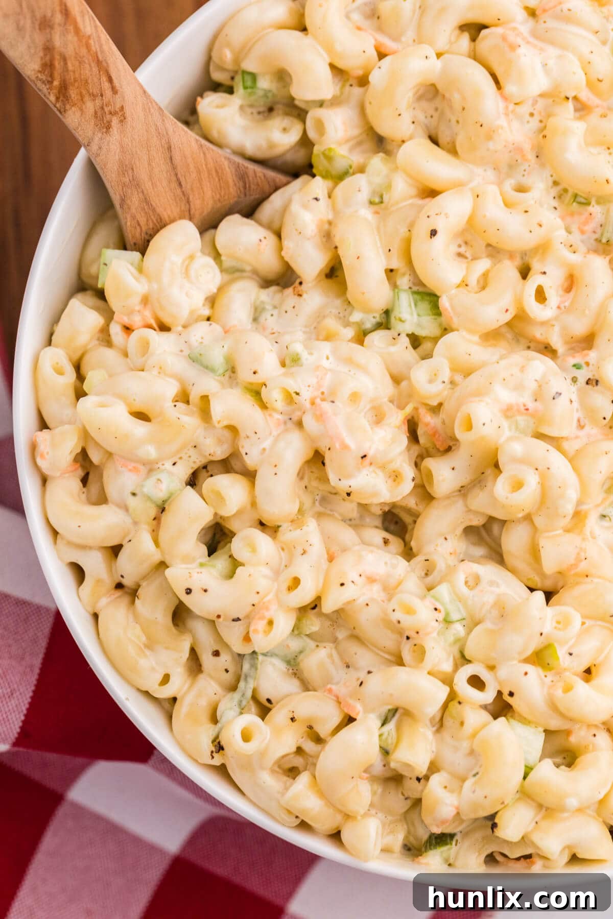 A bowl of the recipe with a wooden spoon.