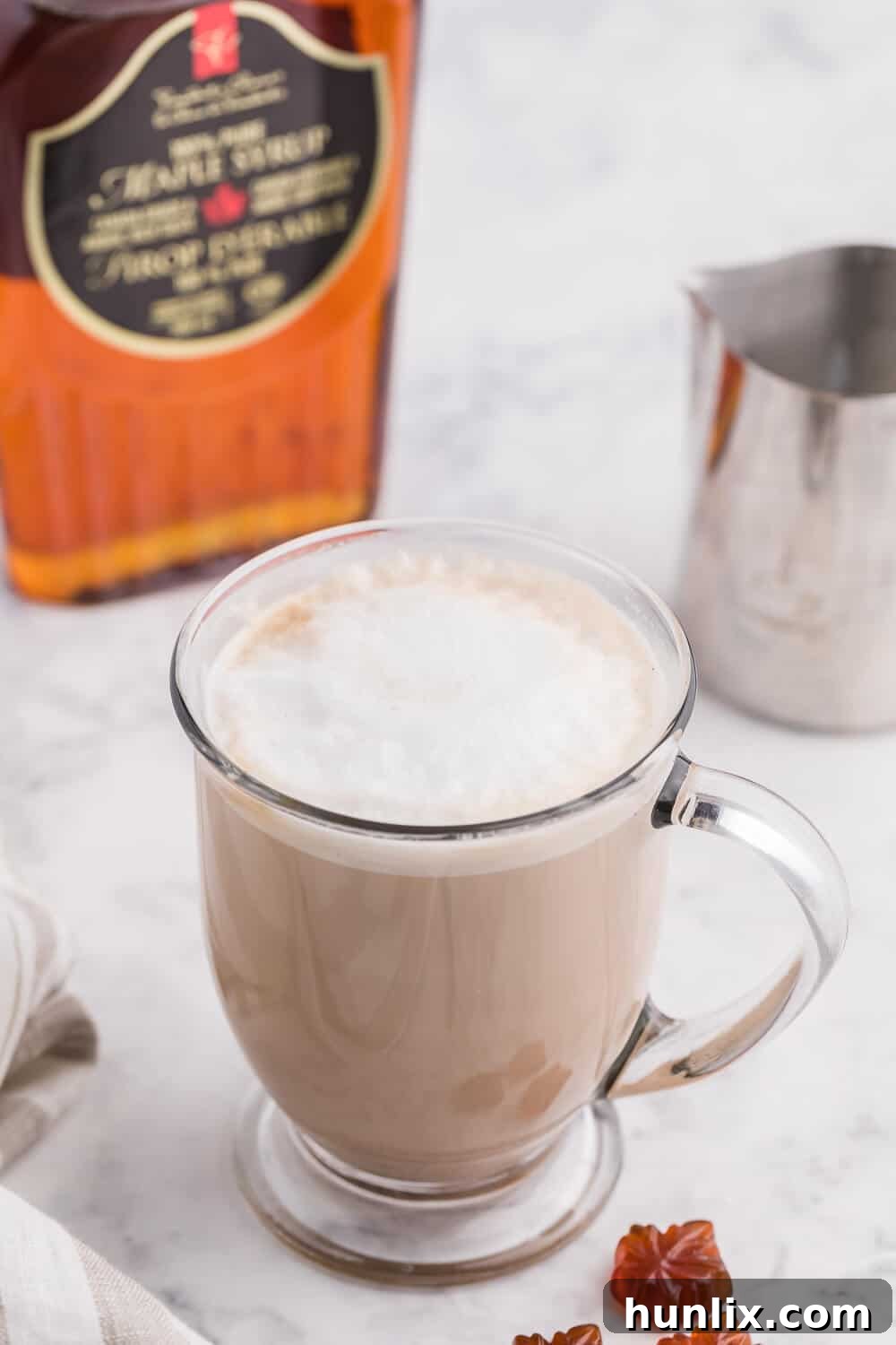 Sip Your Way to Cozy Autumn Bliss 10 A Maple Latte, a sweet maple-flavored coffee drink, perfect for a cozy afternoon.