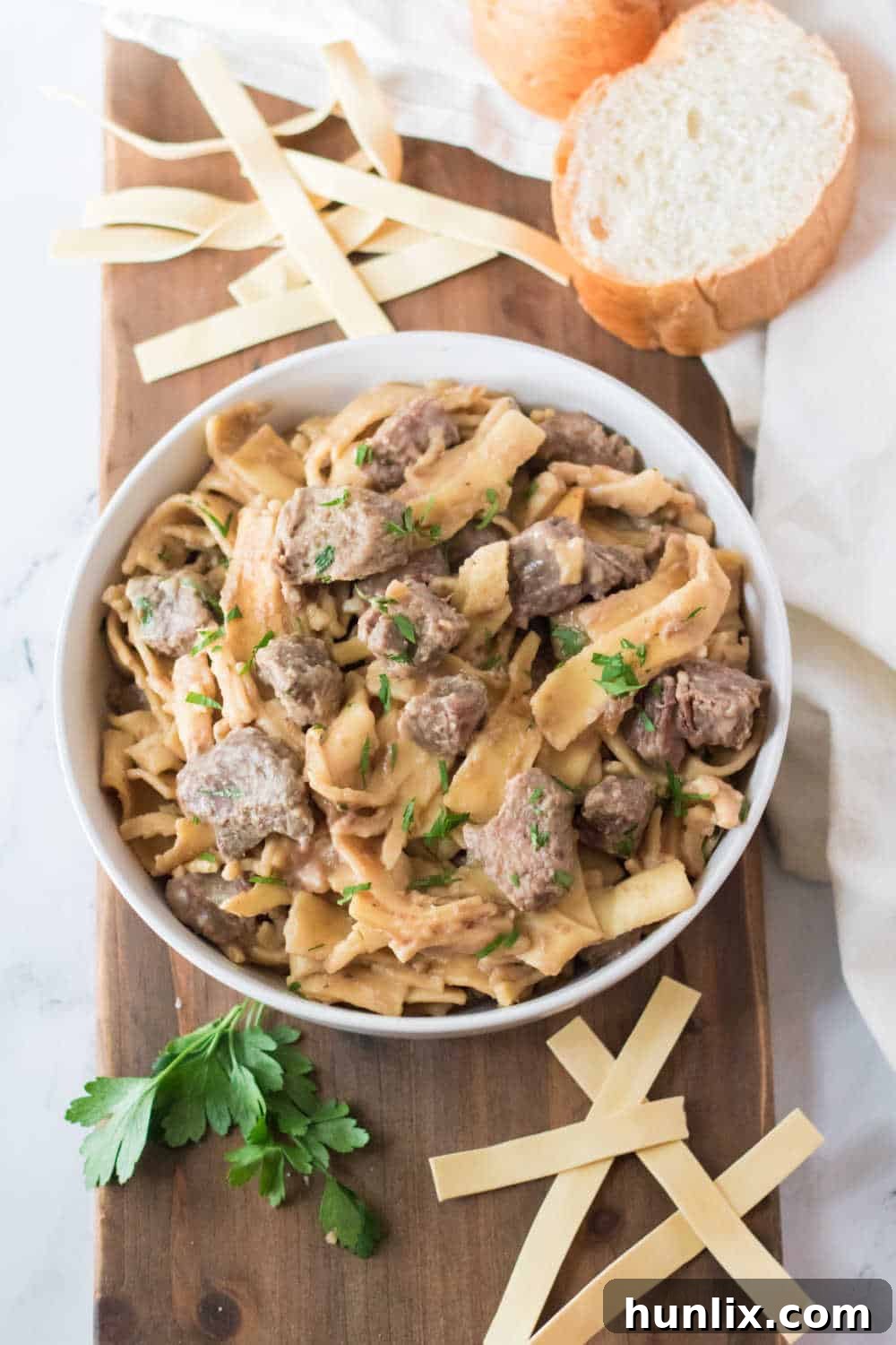 A bowl of Slow Cooker Beef and Noodles, a hearty and comforting crockpot dinner for busy weeknights.