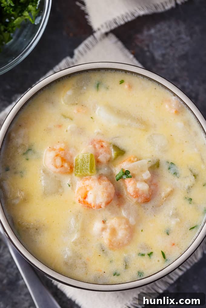 Comfort in a Bowl: Soups and Stews for Cold Days 4 A creamy bowl of Shrimp Chowder topped with fresh herbs.