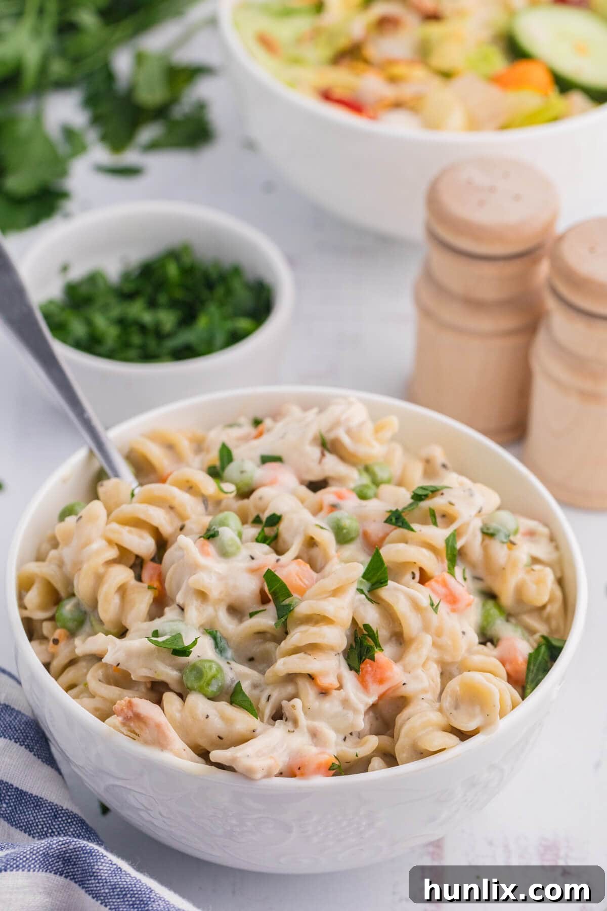 The recipe in a white bowl with a spoon.