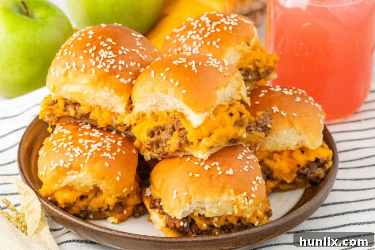 Delicious cheeseburger sliders with melted cheese, ready to be served.