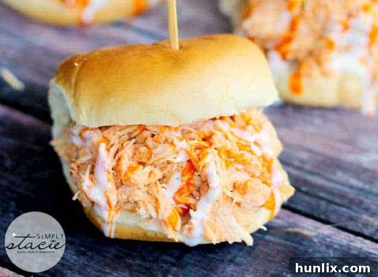 Slow Cooker Buffalo Chicken Sliders, tangy and tender.