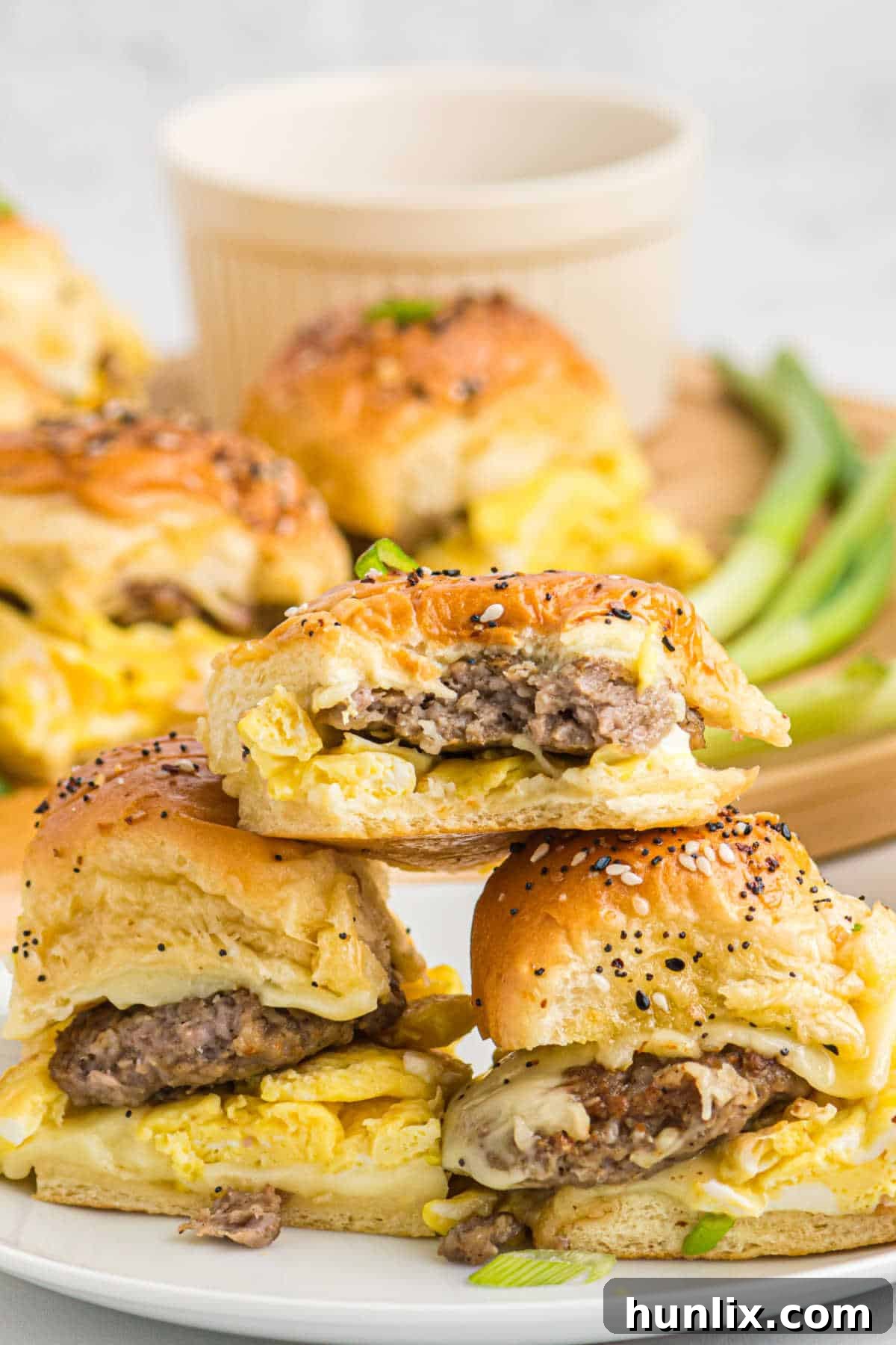 Hearty breakfast sliders with egg, cheese, and sausage.