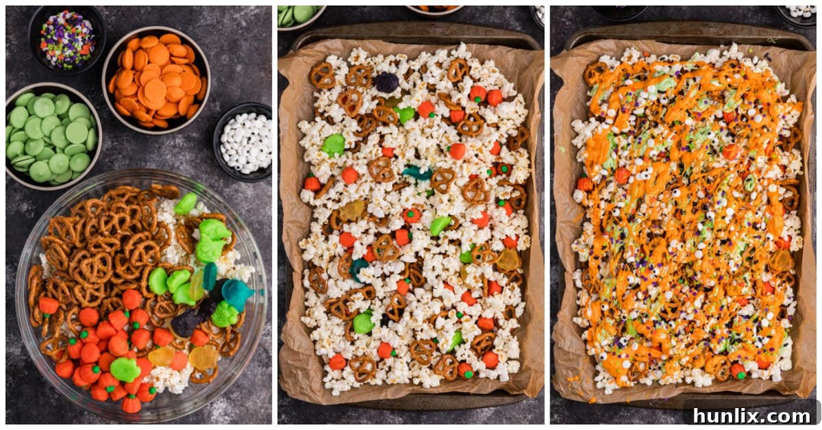 Spooky Halloween Popcorn 4 A baking sheet filled with popcorn, pretzels, and various Halloween candies, partially drizzled with green and orange candy melts, ready for final touches.