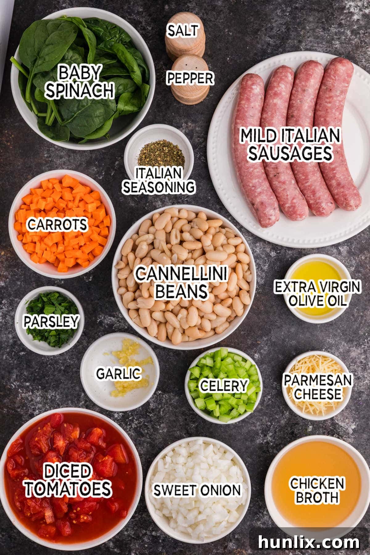 Various soup ingredients laid out on a dark background.