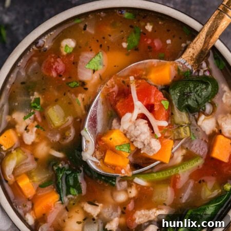 A bowl of the recipe with a spoon in it.