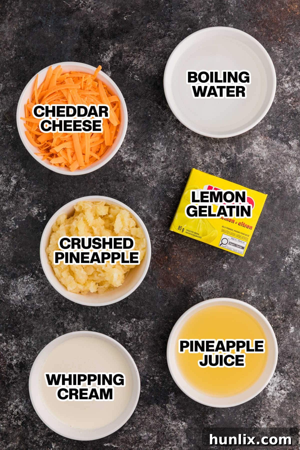 Tropical Pineapple Delight 3 Ingredients for Pineapple Salad on a dark background.