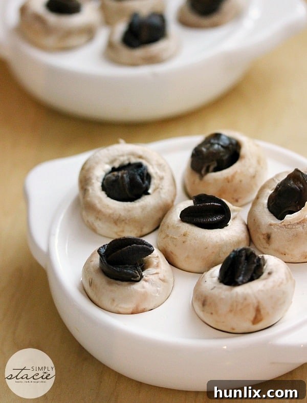 Escargots in Mushroom Caps with Garlic Butter - Serve this easy, gourmet appetizer at your next dinner party. Homemade escargots.