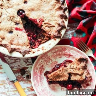 Prairie Berry and Sour Cherry Rye Pie, combining regional berries with a distinct rye crust for a unique taste.